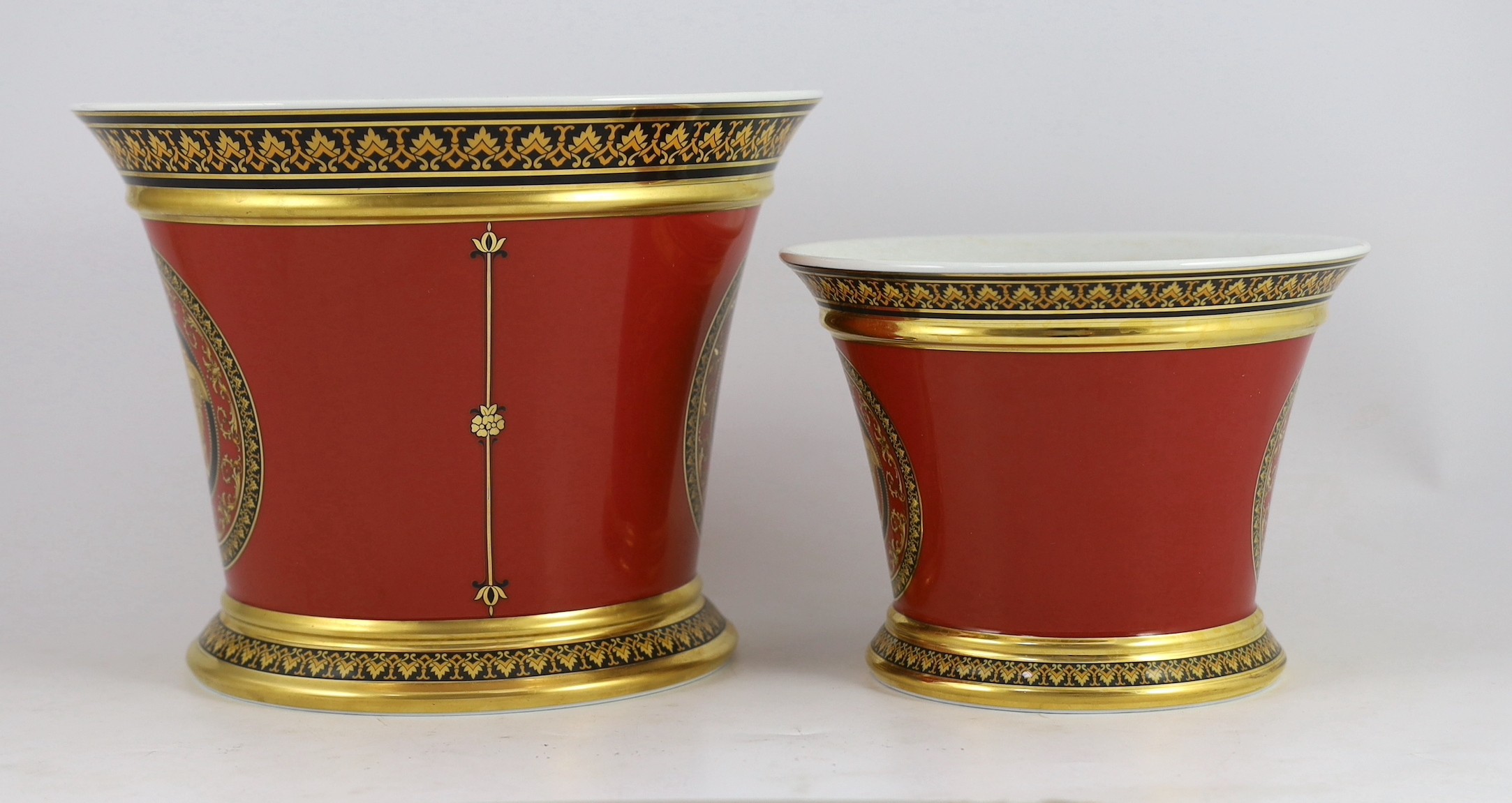 Rosenthal for Versace. A graduated pair of Medusa pattern jardinieres, 19.5cm and 14.5cm high